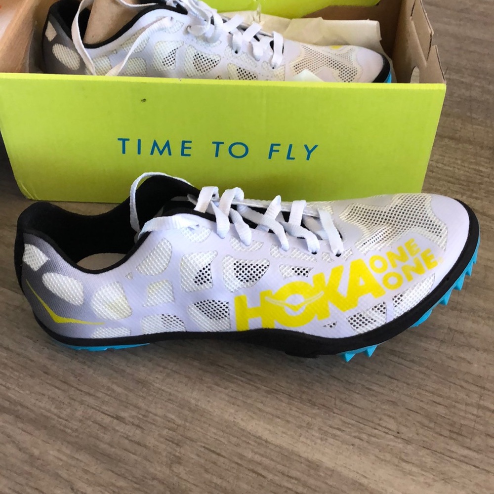 NEW WITHOUT TAGS, Hoka One One Woman’s Rocket LD cleats, Size 7